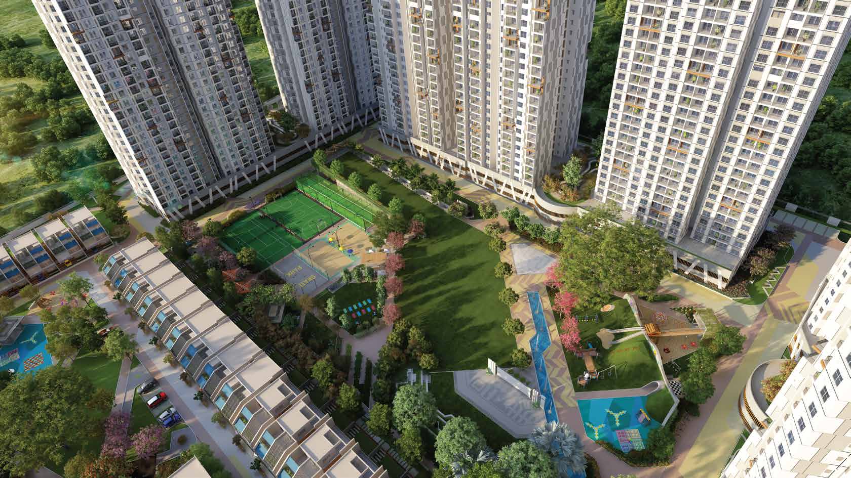 Aerial view of Disha Pursuit of the Elements — towers, villas and landscaped courtyards across twenty acres in Gunjur